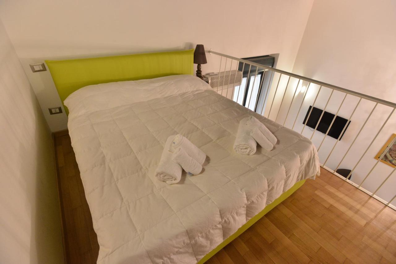 Izzhome City Center Cozy Cagliari Bagian luar foto